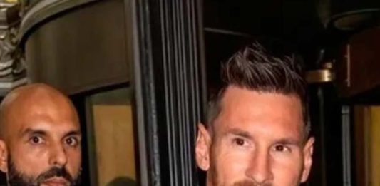 Lionel Messi con su guardaespaldas Yassine Cheuko